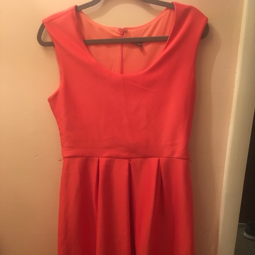 Coral dress with beautiful detail on the bottom